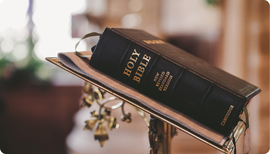 A Holy Bible on a podium.